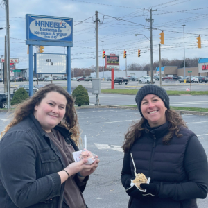 Two women holding ice cream